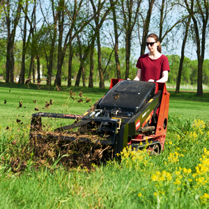 CUL TX 427 with a tiller attachment in a field